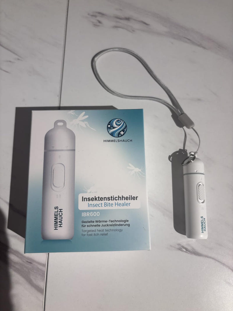 HIMMELSHAUCH Insektenstichheiler mit Trageschlaufe neben der Verpackung
