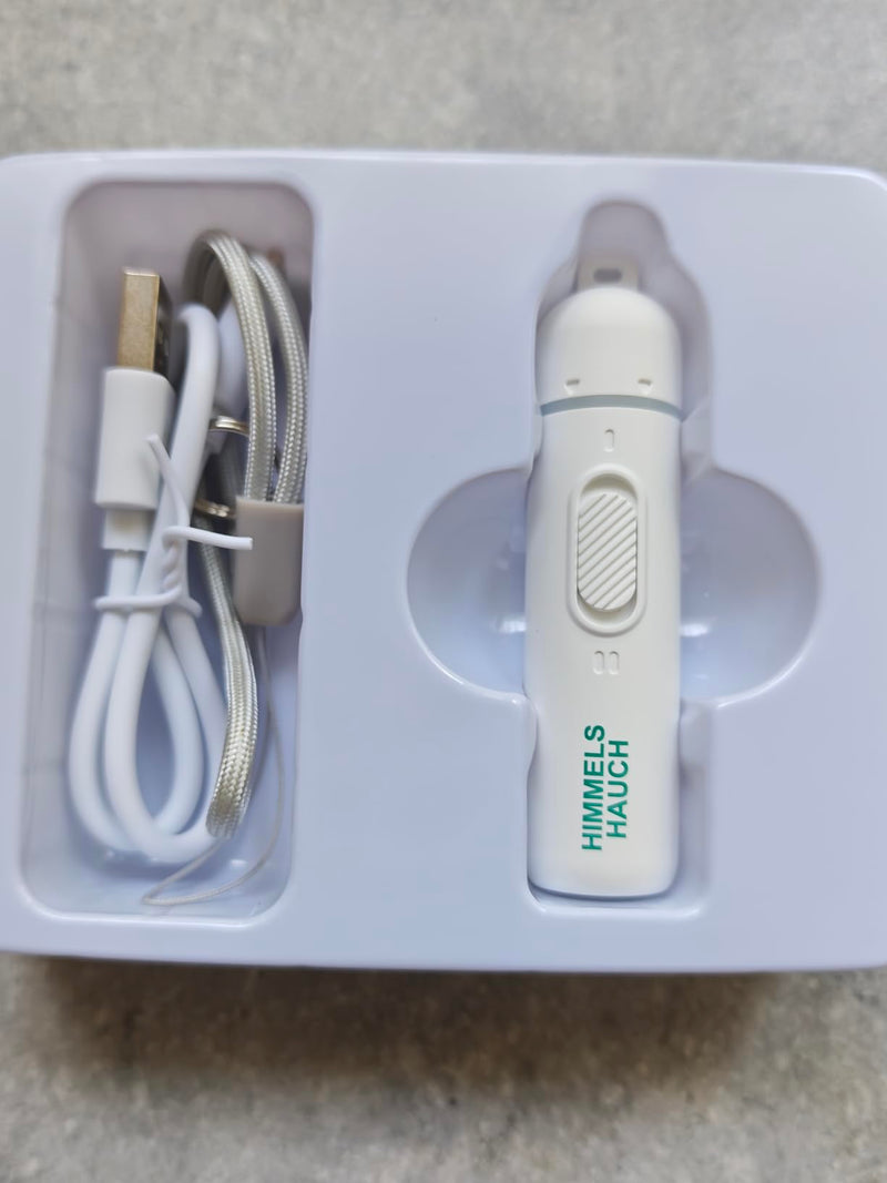 HIMMELSHAUCH Insektenstichheiler und USB-Ladekabel in der Verpackung